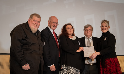 Angela Henricksen, Archival Survival, presents the Award to Friends of J Ward